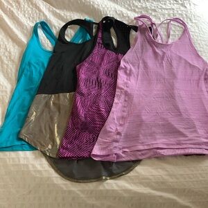 Bundle of 4 XS workout tanks